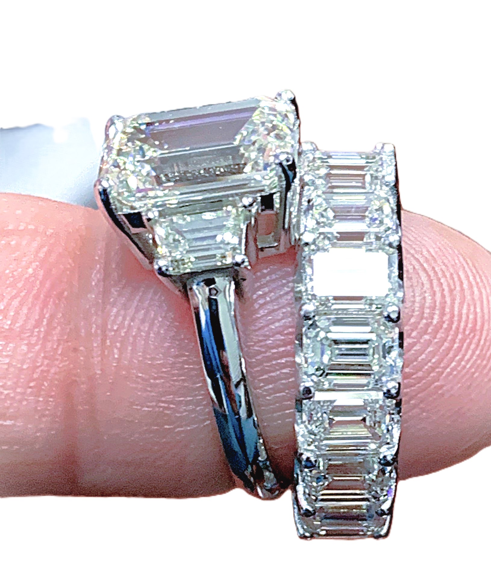 Emerald & Trapezoid Three Stone Ring with Huge Eternity Band